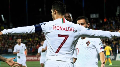 Cristiano Ronaldo celebrates his opening goal against Lithuania.