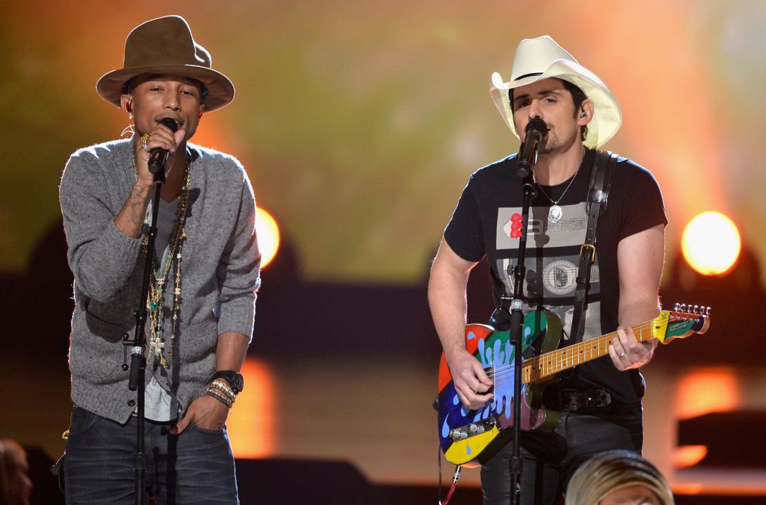 Recording artists Pharrell Williams and Brad Paisley perform onstage during "The Night That Changed America: A Grammy salute to the Beatles" at the Los Angeles Convention Center on January 27, 2014 in Los Angeles, California.  