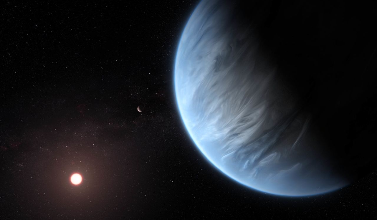 This artist's illustration showcases exoplanet K2-18b orbiting its host star. It's currently the only super-Earth exoplanet that has water vapor in its atmosphere and could be within the right temperature to support life. 