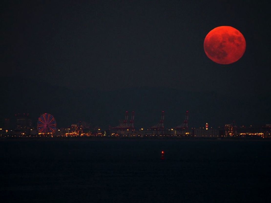 Doucet took this image in 2015 that shows the "blood" moon rising above Osaka, Japan.