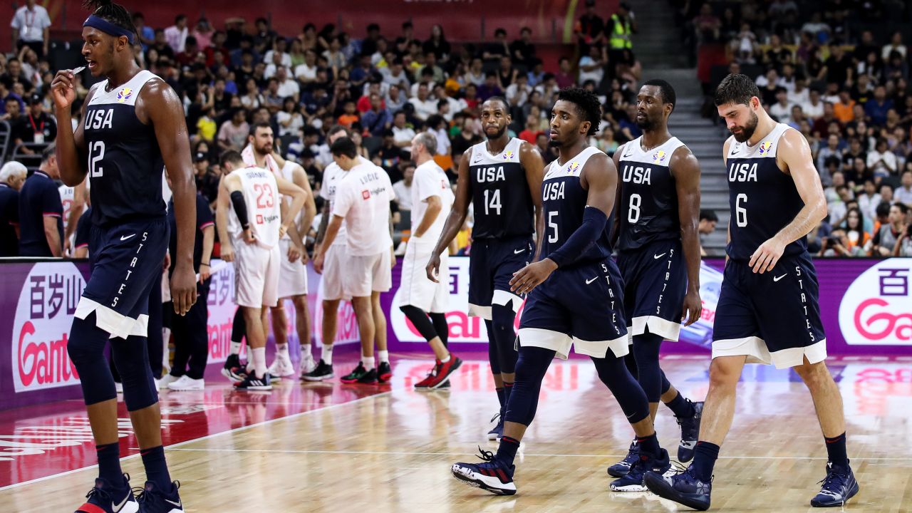 Players of Team USA show their dejection, losing to Serbia on Thursday.