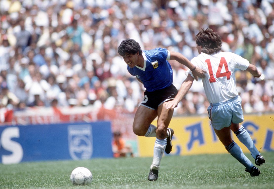 Diego Maradona beats England defender Terry Fenwick on his way to scoring his outstanding individual second goal in the 1986 World Cup quarterfinal.