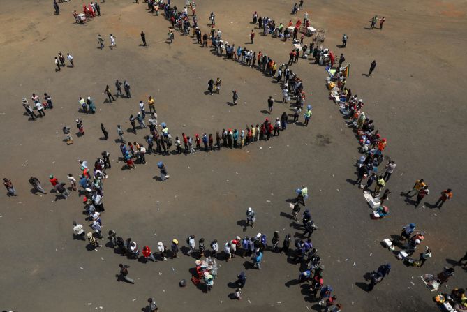 Mourners line up outside a stadium in Mbare, Zimbabwe, where former President Robert Mugabe would be lying in state on Thursday, September 12. <a href="http://www.cnn.com/2013/07/31/africa/gallery/robert-mugabe/index.html" target="_blank">Mugabe died last week</a> at the age of 95. He held office for over three decades before being deposed in a coup in 2017.