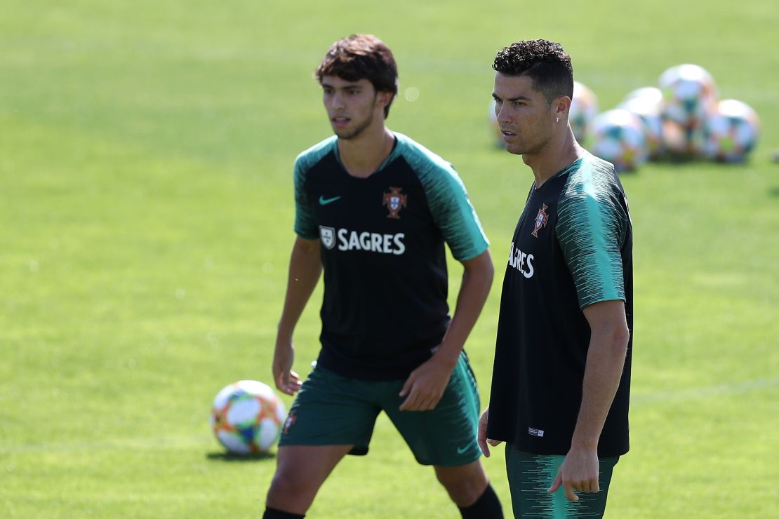 Joao Felix (L) and Portugal's forward Cristiano Ronaldo with the Portugal national team.