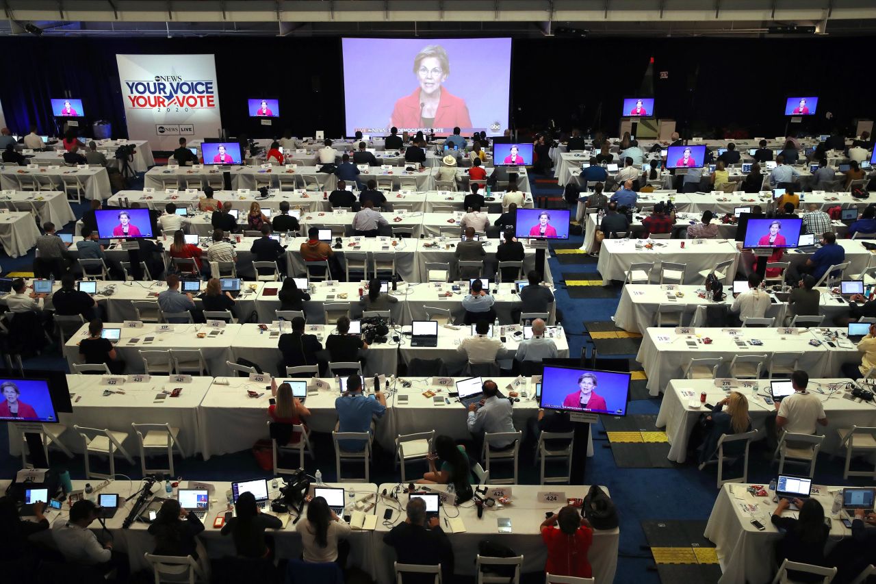 Journalists work at the site of the debate.