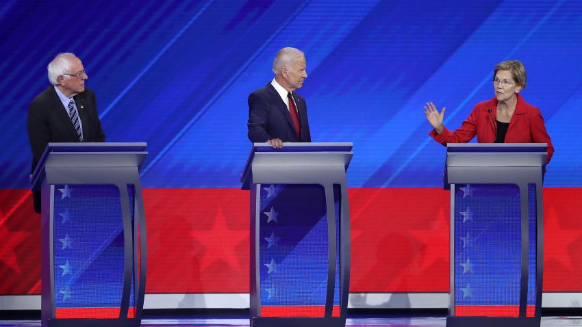 HOUSTON, TEXAS - SEPTEMBER 12: Democratic presidential candidates Sen. Bernie Sanders (I-VT) and former Vice President Joe Biden look on as Sen. Elizabeth Warren (D-MA) speaks during the Democratic Presidential Debate at Texas Southern University's Health and PE Center on September 12, 2019 in Houston, Texas. Ten Democratic presidential hopefuls were chosen from the larger field of candidates to participate in the debate hosted by ABC News in partnership with Univision. (Photo by Win McNamee/Getty Images)