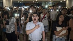 Demonstrators chant slogans during a flash mob at the International Finance Center (IFC) Mall in Hong Kong, China, on Thursday, Sept. 12, 2019. Hong Kong police banned a planned Sunday march and gathering called by the organizer of some of the citys biggest protests, days after demonstrators set fire to a central subway station as the pro-democracy movement carries on into autumn. Photographer: Chan Long Hei/Bloomberg via Getty Images