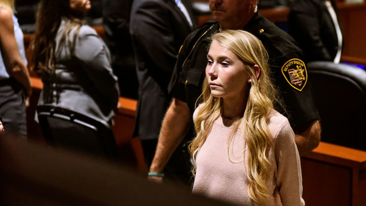 Brooke Skylar Richardson is escorted out of the courtroom after the verdict in her trial in Lebanon, Ohio.