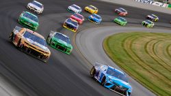 Cars race during the Monster Energy NASCAR Cup Series Quaker State 400 on July 13, 2019, at Kentucky Speedway in Sparta, Kentucky.