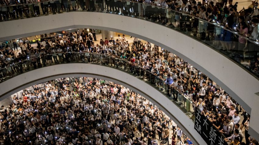 Protesters sing songs and shout slogans after gathering at the IFC Mall on September 12, 2019 in Hong Kong, China.