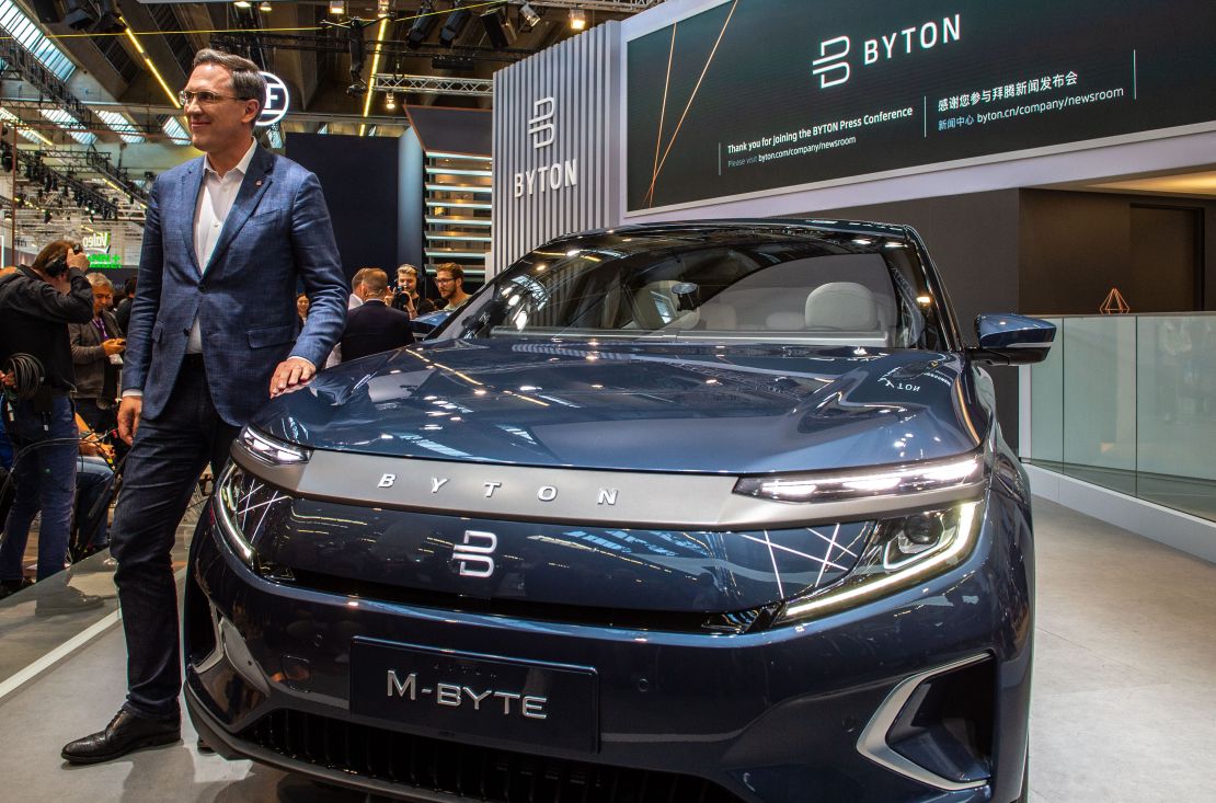 Byton, a China-based electric carmaker founded by former Nissan and BMW executives, unveiled its first production car at Frankfurt.  It's shown here with Byton CEO Daniel Kirchet. The M-Byte takes interior computer screens to an extreme -- even having one mounted in the steering wheel. With prices starting around $45,000, Byton hopes to compete against electric cars from more established automakers like BMW and Mercedes-Benz. Sophisticated driving assistance technology will be a major selling point. 