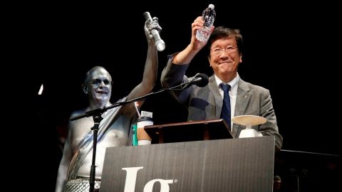 Shigeru Watanabe, of Japan, receives the Ig Nobel award in chemistry for estimating the total saliva volume produced per day by a typical five-year-old, at the 29th annual Ig Nobel awards ceremony at Harvard University.