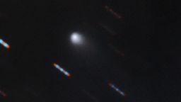 Gemini Observatory two-color composite image of C/2019 Q4 (Borisov) which is the first interstellar comet ever identified. This image was obtained using the Gemini North Multi-Object Spectrograph (GMOS) from Hawaii's Maunakea. The image was obtained with four 60-second exposures in bands (filters) r and g. Blue and red dashes are images of background stars which appear to streak due to the motion of the comet. Composite image by Travis Rector.
Image Credit: Gemini Observatory/NSF/AURA
