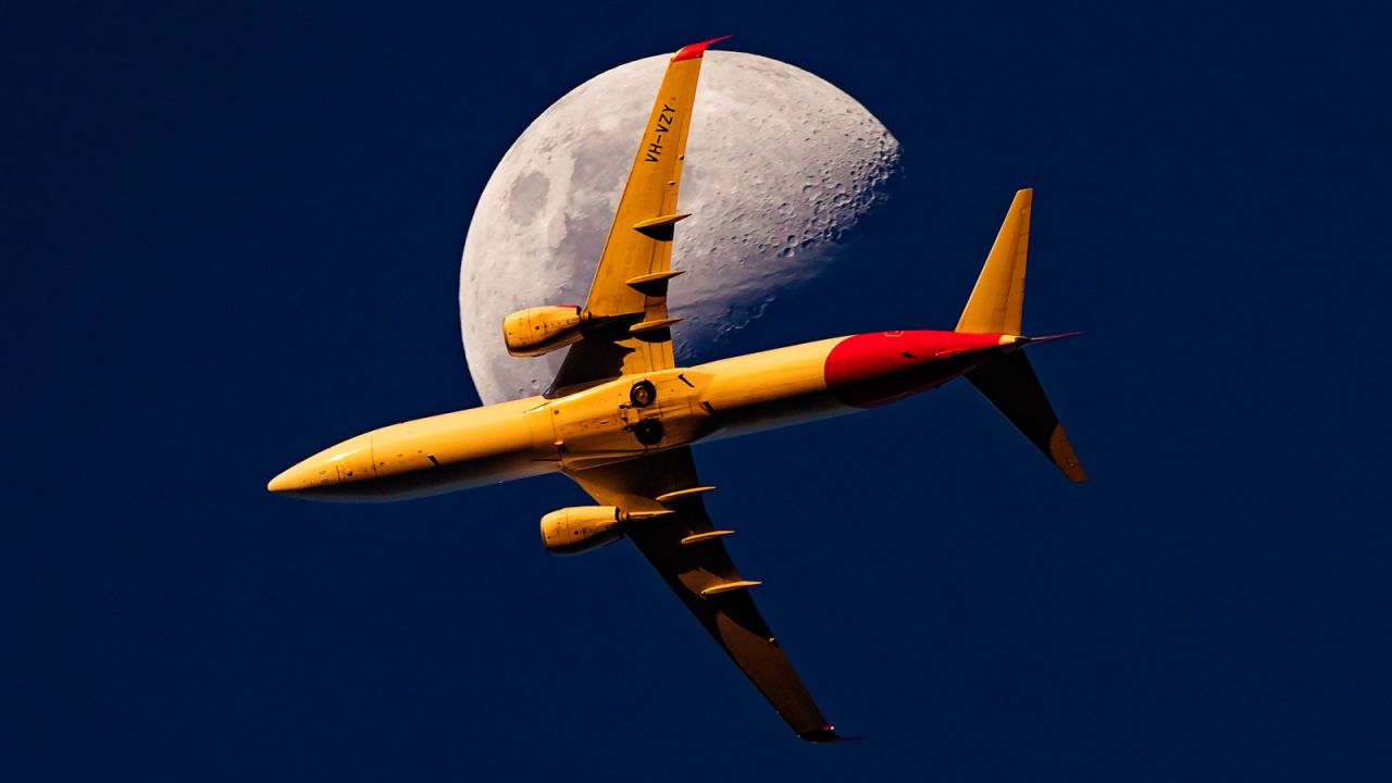 <strong>Celestial sight:</strong> Marston took this picture of a Qantas Boeing 737 above Brisbane. 