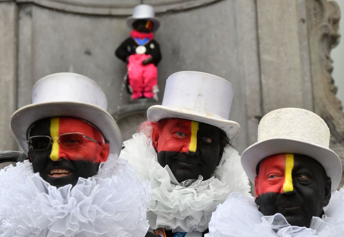 The "Noirauds" or "Blackies" -- a group that marks Belgium's annual carnival season by charitable fund-raising in black face paint -- changed their colours to resemble the Belgian flag in 2019.
