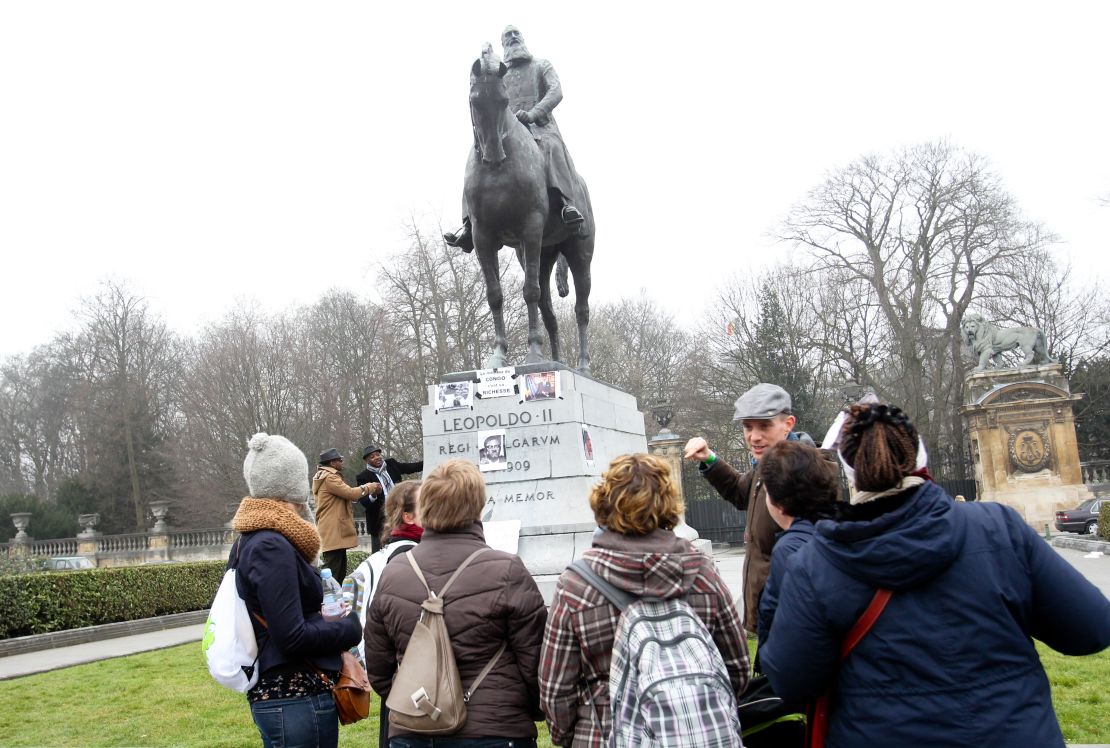 Protesters gather at a statue of Leopold II in Brussels.