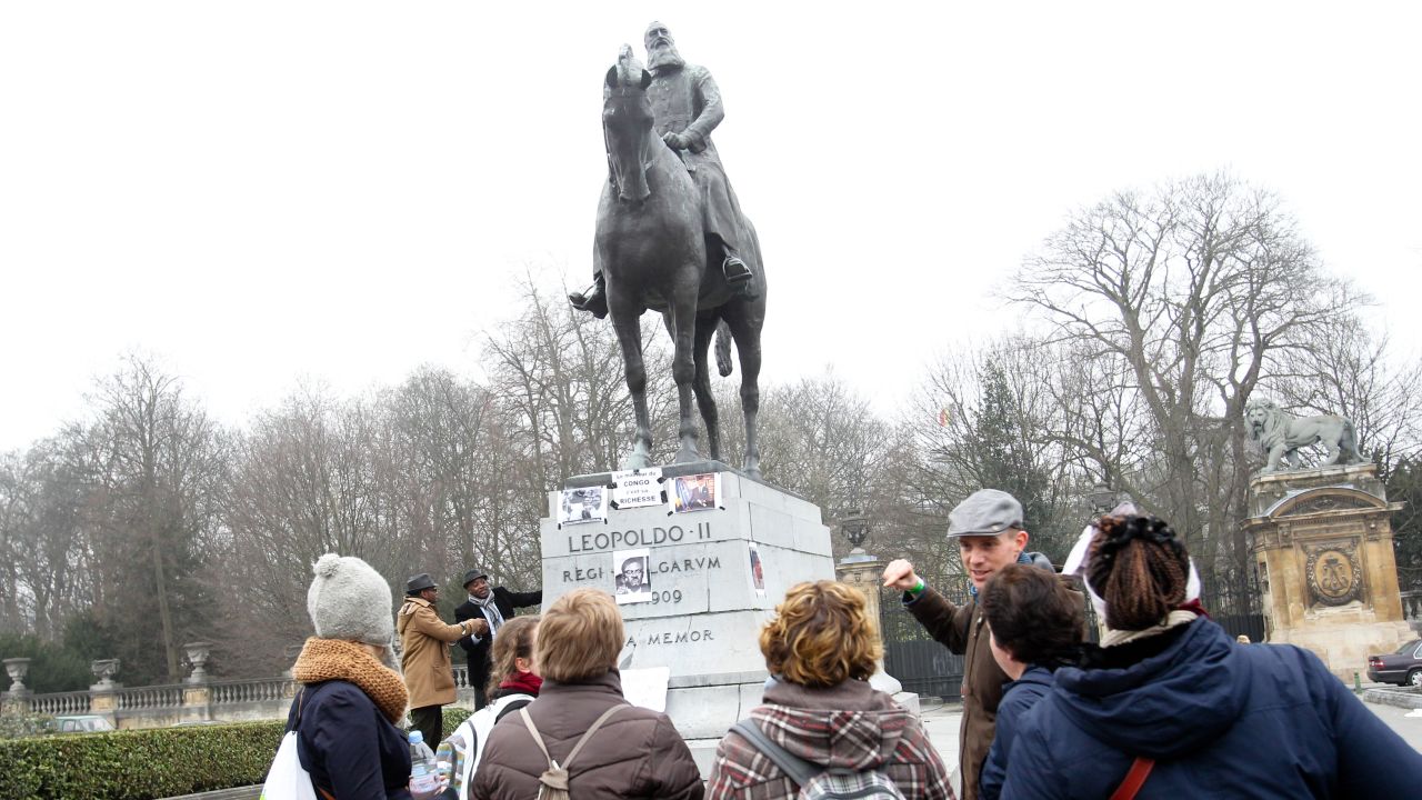 Protesters gather at a statue of Leopold II in Brussels.