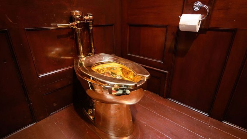WOODSTOCK, ENGLAND - SEPTEMBER 12: "America", a fully-working solid gold toilet, created by artist Maurizio Cattelan, is seen at Blenheim Palace on September 12, 2019 in Woodstock, England. The Italian artist is known as the prankster of the art world. His most notable piece being "America" a solid gold usable toilet which had art lovers queuing to use when it was shown at the Guggenheim Museum in New York. (Photo by Leon Neal/Getty Images)