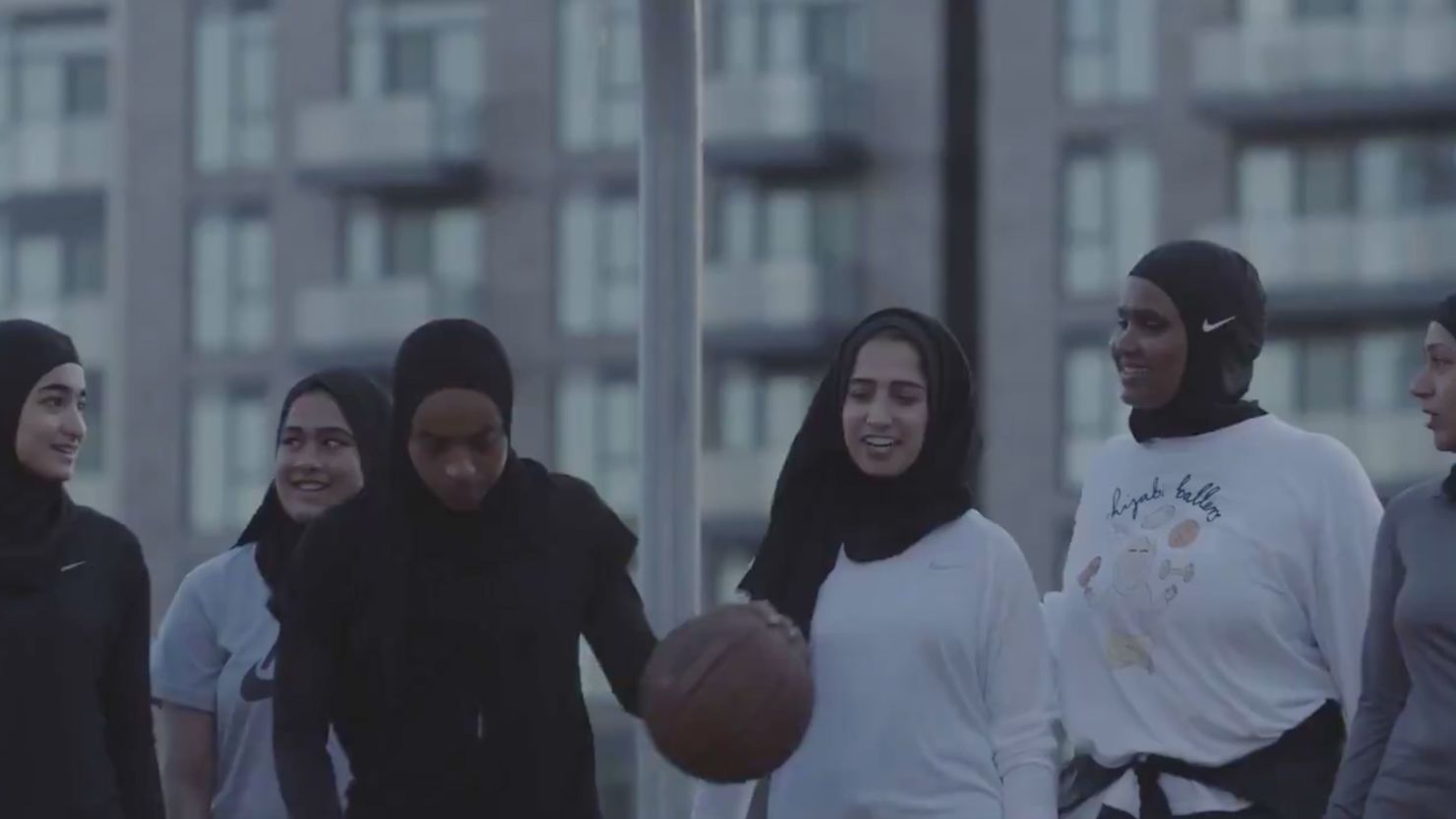 Muslim women play basketball in a video released by the Toronto Raptors. 