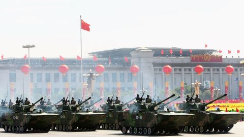 Chinese tanks rumble pass Tiananmen Square during a massive parade to celebrate the 60th anniversary of the founding of the People's Republic of China on October 1, 2009 in Beijing.