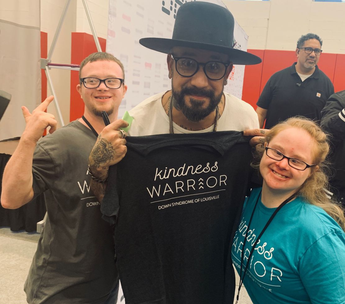AJ McLean of the Backstreet Boys poses with members of  Down Syndrome of Louisville.