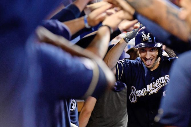 Milwaukee's Ryan Braun celebrates with teammates after a home run in Miami on Thursday, September 12.