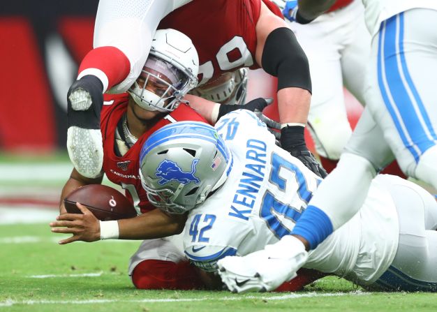 Arizona quarterback Kyler Murray catches a knee in the head as he's sacked by Detroit's Devon Kennard on Sunday, September 8.