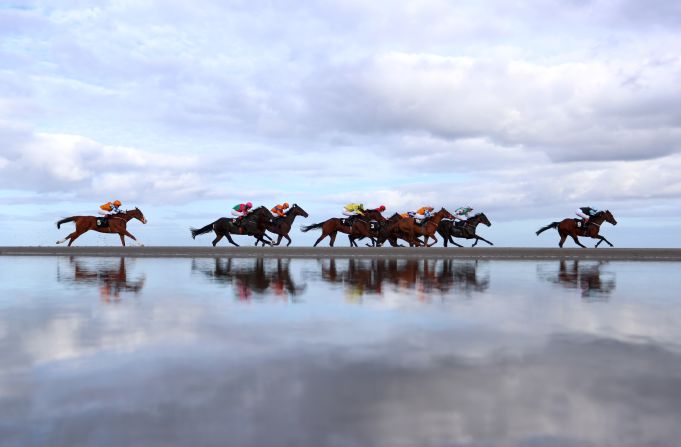 Horses race in Laytown, Ireland, on Wednesday, September 11.