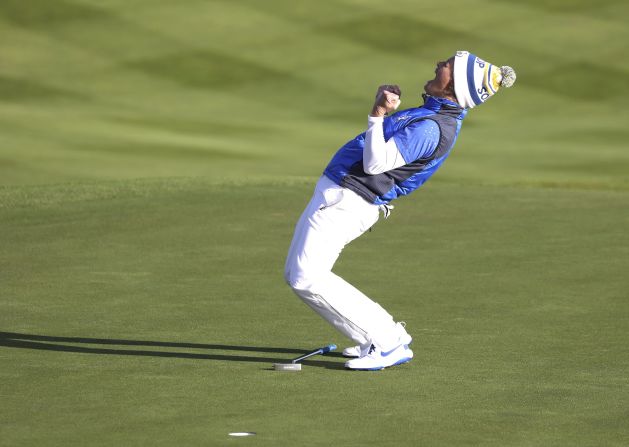 Swedish golfer Suzann Pettersen celebrates after sinking a putt to win the Solheim Cup for Europe on Sunday, September 15. 