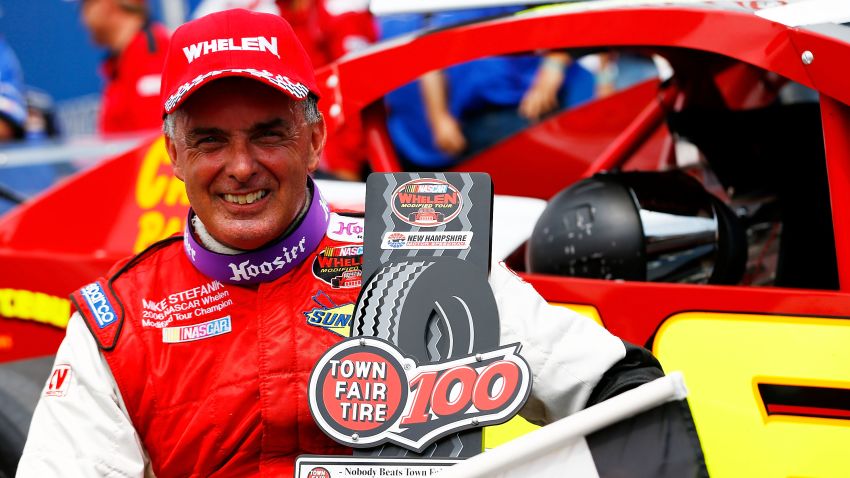 LOUDON, NH - JULY 14:  Mike Stefanik, driver of the #66 Canto & Sons Pvng/Robert B. Our Co. Ford, celebrates in Victory Lane after winning the NASCAR Whelen Modified Tour Town Fair Tire 100 at New Hampshire Motor Speedway on July 14, 2012 in Loudon, New Hampshire.  (Photo by Jared Wickerham/Getty Images for NASCAR)