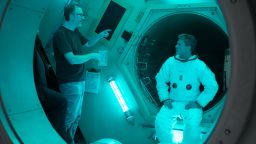 James Gray (left) directs Brad Pitt (right) on the set of upcoming sci-fi thriller "Ad Astra."