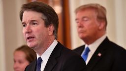 Supreme Court nominee Brett Kavanaugh (L) speaks as US President Donald Trump listens after he announced his nomination in the East Room of the White House on July 9, 2018 in Washington, DC. (Photo by MANDEL NGAN / AFP)        (Photo credit should read MANDEL NGAN/AFP/Getty Images)