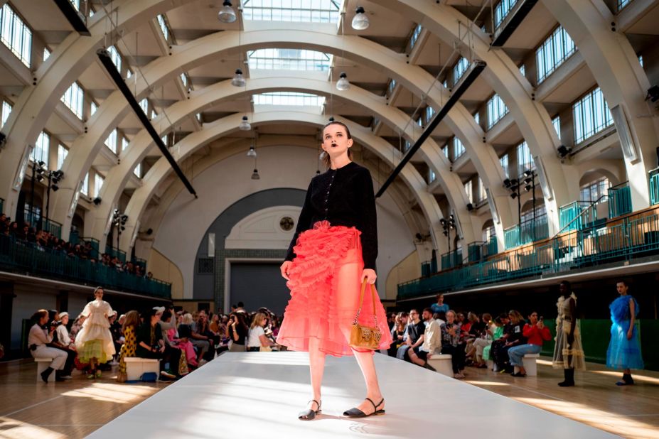 A model presents a creation from Molly Goddard during a catwalk show for the Spring/Summer 2020 collection on the second day of London Fashion Week in London on September 14, 2019. 