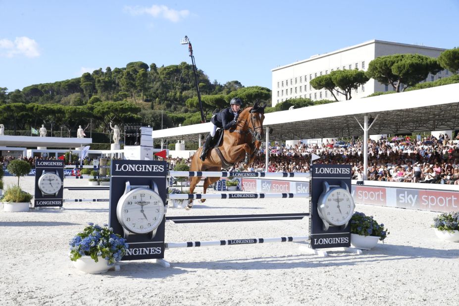 Britain's Ben Maher, the defending overall champion, clinched the Rome Grand Prix to climb to the top of the season standings. 