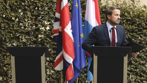 Xavier Bettel addresses the meida next to an empty lectern intended for British Prime Minister Boris Johnson.