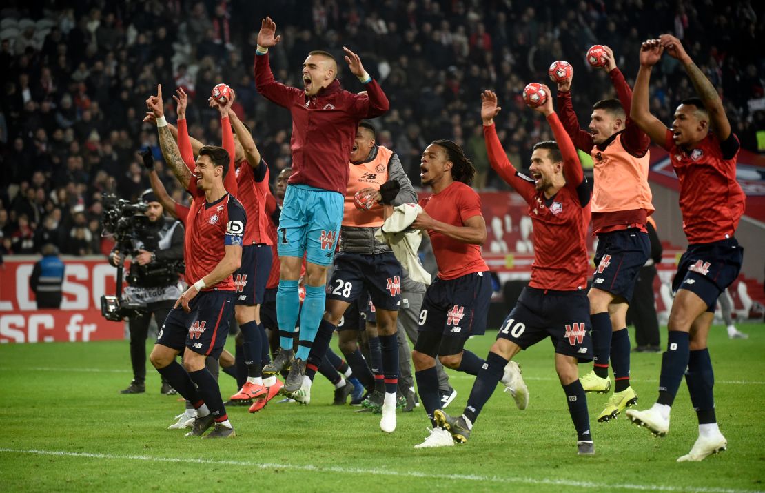 Lille's players celebrate hammering PSG 5-1 towards the end of last season.