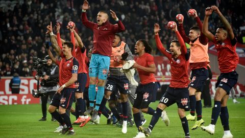 Lille's players celebrate hammering PSG 5-1 towards the end of last season.