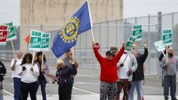 FLINT, MI - SEPTEMBER 16: United Auto Workers (UAW) members picket at a gate at the General Motors Flint Assembly Plant after the UAW declared a national strike against GM at midnight on September 16, 2019 in Flint, Michigan. Nearly 50,000 members of the United Auto Workers went on strike after their contract expired and the two parties could not come to an agreement.  (Photo by Bill Pugliano/Getty Images)