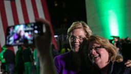 Sen. Elizabeth Warren, poses for a photograph with a supporter during an event at Washington Square Park in New York, U.S., on Monday, September 16, 2019. 