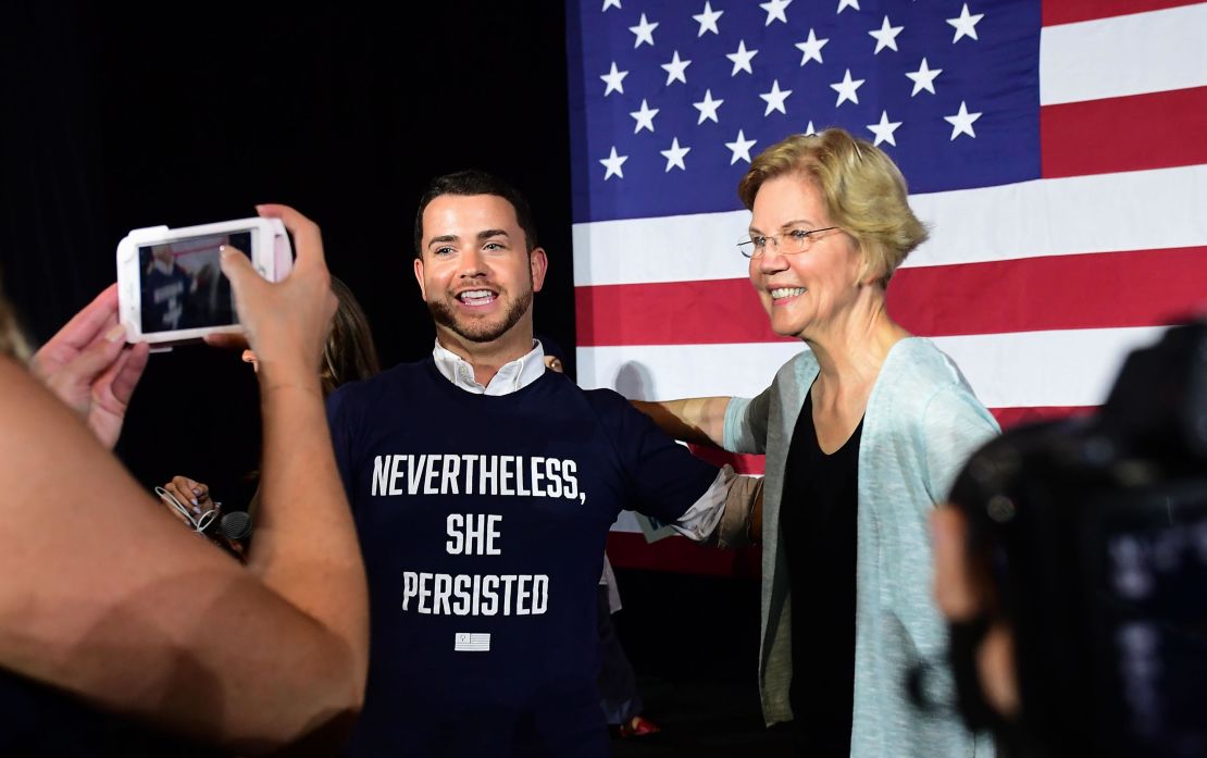 Sen. Elizabeth Warren poses for photos with supporters after hosting a town hall at the Shrine Auditorium in Los Angeles, California on August 21, 2019.