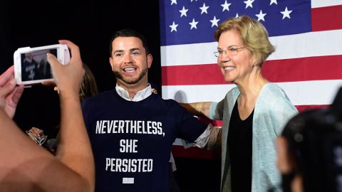 Sen. Elizabeth Warren poses for photos with supporters after hosting a town hall at the Shrine Auditorium in Los Angeles, California on August 21, 2019.