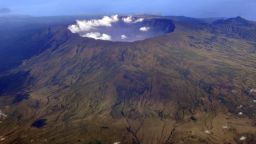 In this Oct. 19, 2010 aerial photo, Mount Tambora's 10 kilometers (more than 7 miles) wide and 1 kilometer (half a mile) deep volcanic crater, created by the April 1815 eruption, is shown. Bold farmers routinely ignore orders to evacuate the slopes of live volcanos in Indonesia, but those on Tambora took no chances when history's deadliest mountain rumbled ominously this month, Sept., 2011. (AP Photo/KOMPAS Images, Iwan Setiyawan) EDITORIAL USE ONLY