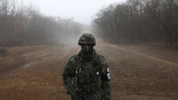 DMZ, SOUTH KOREA - DECEMBER 03:  A South Korean soldier stands at the Military Demarcation Line (MDL) between South and North Korea, a site of fierce battles in the 1950-53 Korean War, to build a tactical road across MDL inside the Demilitarized Zone (DMZ), in the central section of the inter-Korean border on December 3, 2018 in DMZ, South Korea. The two Koreas connected the 3-kilometer-long road at Arrowhead Ridge, a site of fierce battles in the 1950-53 Korean War. South Korea thinks it is still possible for N.K. leader to visit S. Korea this year.  (Photo by Chung Sung-Jun/Getty Images)