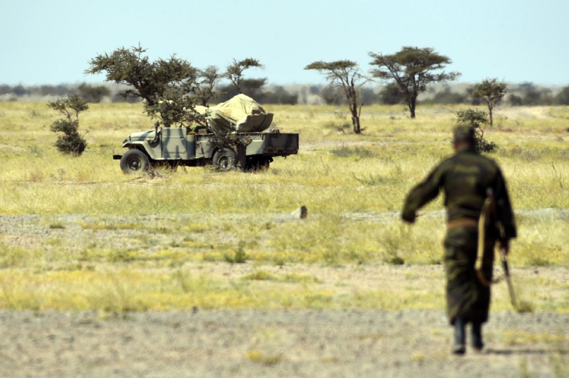 A member of the Polisario Front stands guard during a visit of then-United Nations chief Ban Ki-Moon on March 5, 2016, in Bir-Lahlou, in Western Sahara.