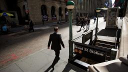 A pedestrian walks along Wall Street near the New York Stock Exchange (NYSE) in New York, U.S., on Monday, Sept. 11, 2017. The record-setting rally in U.S. stocks is back on. After a five-week hiatus without any all-time highs, the S&P 500 Index climbed as much as 0.9 percent to 2,483.81 and was poised for its 31st record close this year. Photographer: Michael Nagle/Bloomberg via Getty Images