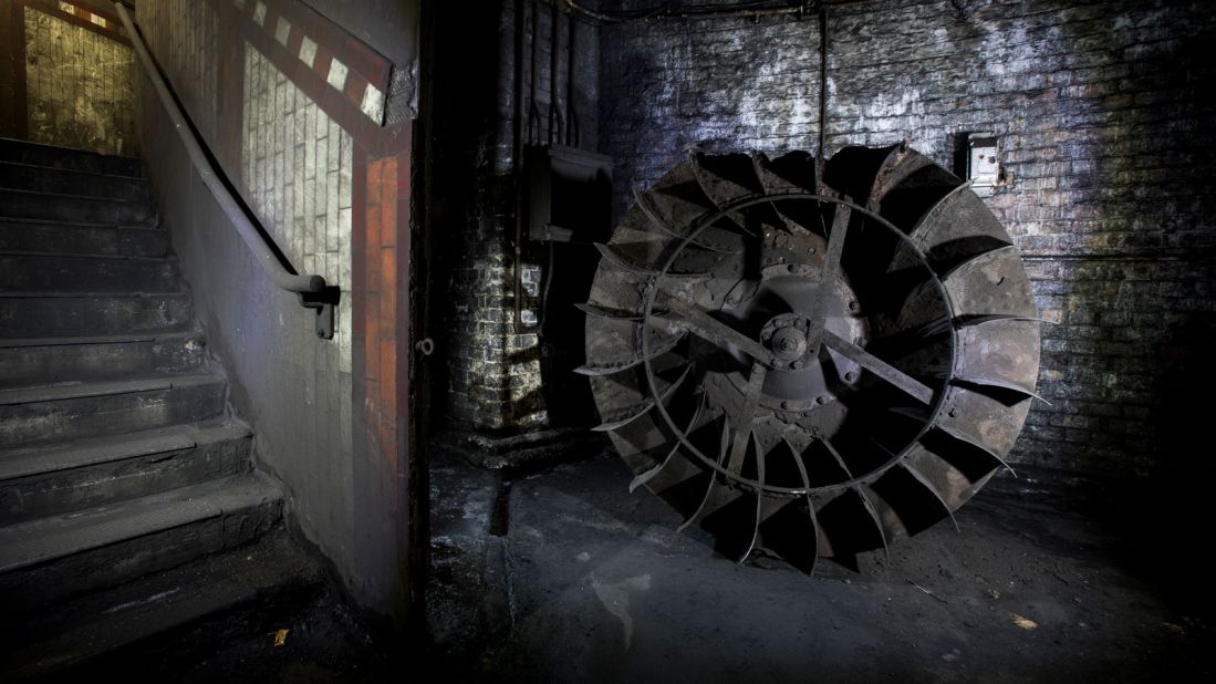 <strong>Empty shafts: </strong>A redundant fan impeller located in a dark corner of disused York Road station.