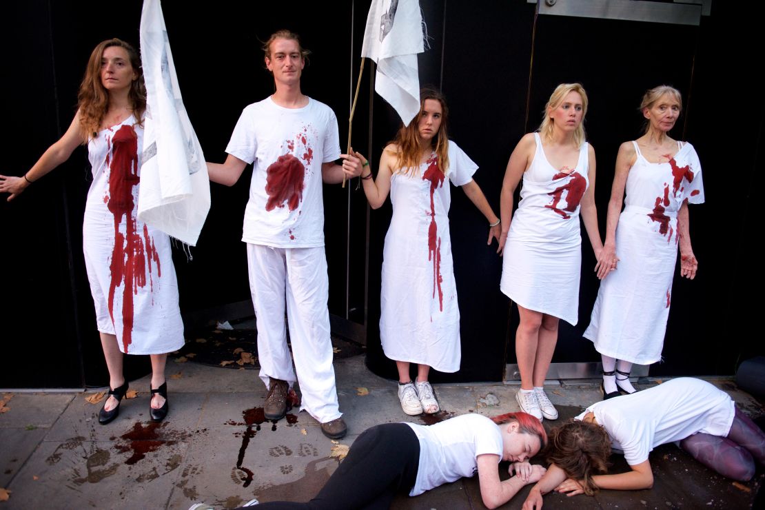 Extinction Rebellion activists glued themselves to the entrance of London Fashion Week's central venue on September 13. 