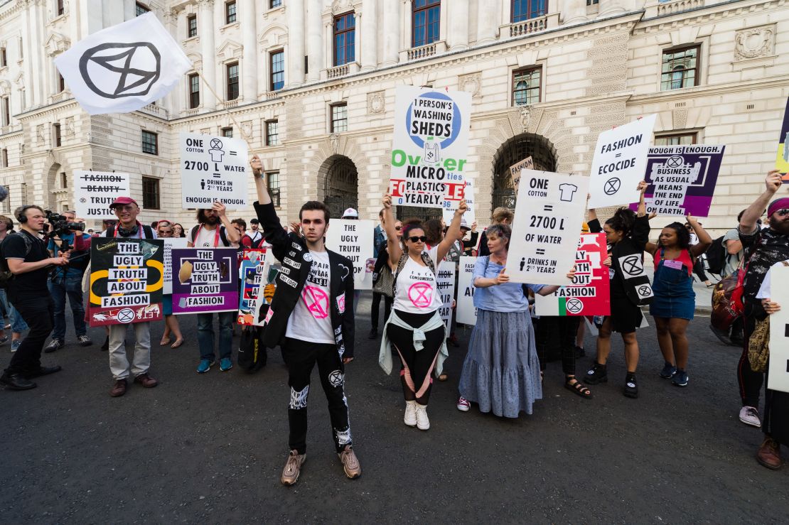 Extinction Rebellion activists protested outside Victoria Beckham's London Fashion Week Show Sunday.