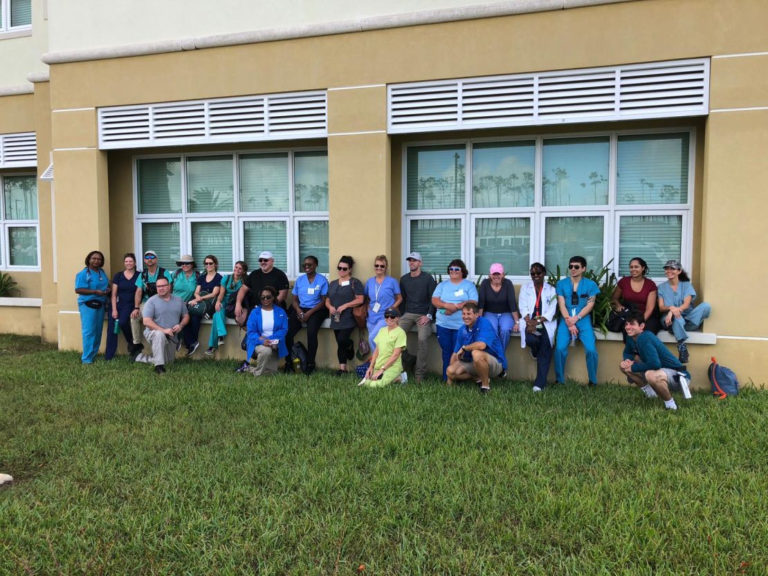 Some of the medics gather in front of an emergency operations center in Freeport, Bahamas.
