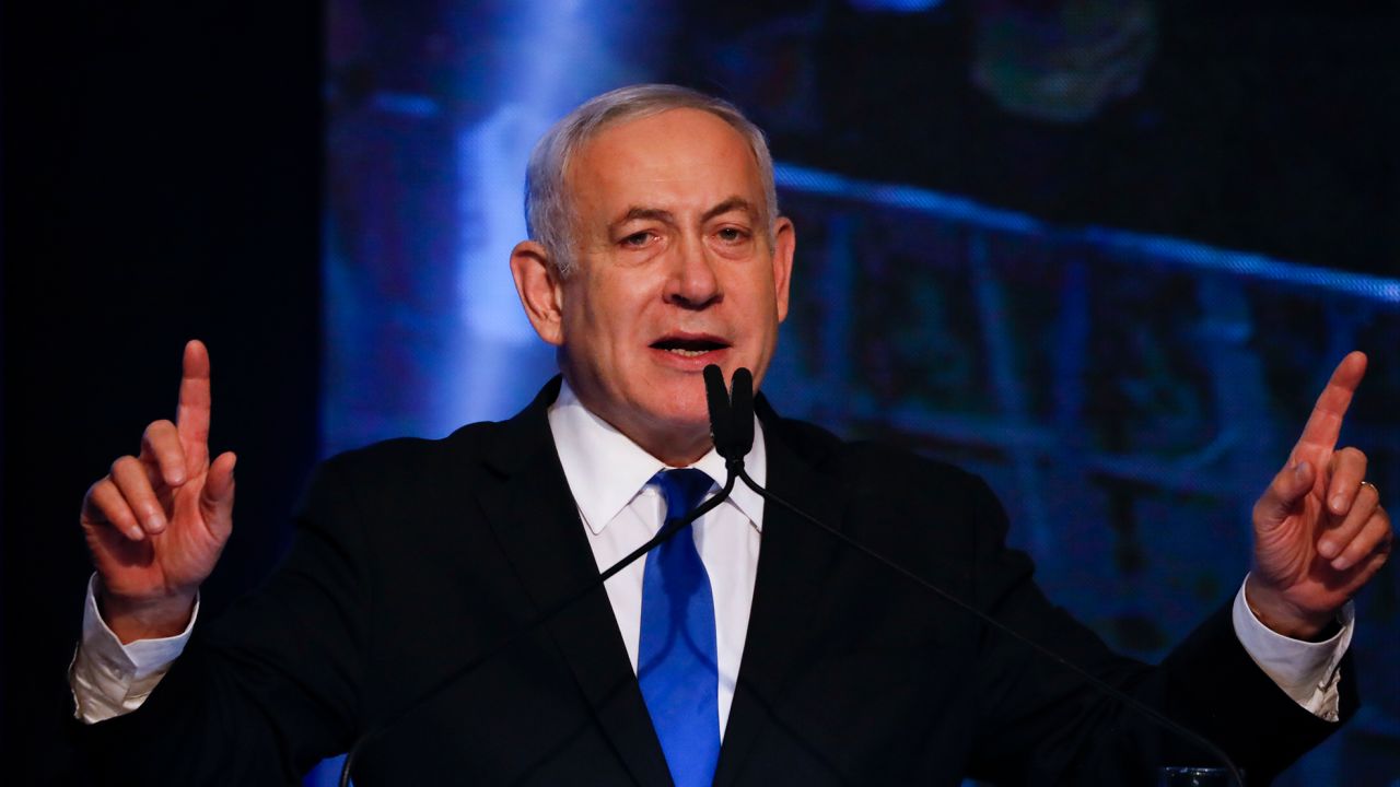 Israeli Prime Minister Benjamin Netanyahu addressees his supporters at party headquarters after elections in Tel Aviv, Israel, Wednesday, Sept. 18, 2019.